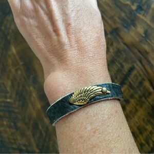 Worn Soft Leather Bracelet with Gold Wing Detail